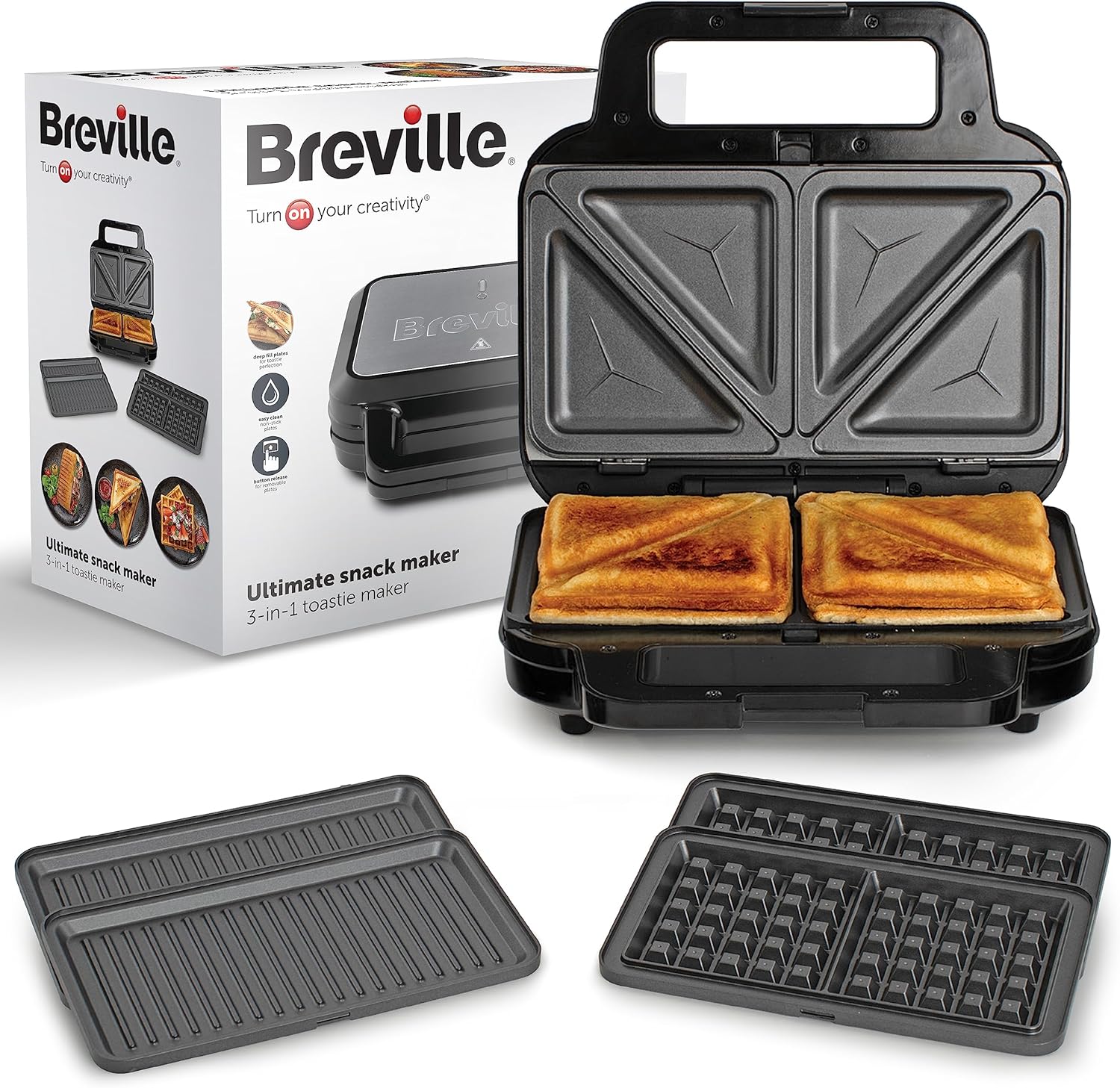 Breville 3-in-1 Ultimate Snack Maker with toasties inside, featuring interchangeable plates for making waffles, toasties, and paninis, alongside the product box.